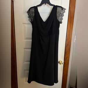 Elegant Black Dress with Lace Sleeves